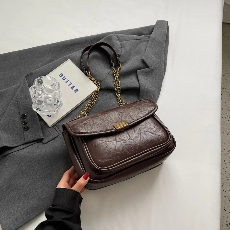 Éveloire Chain Flap Bag