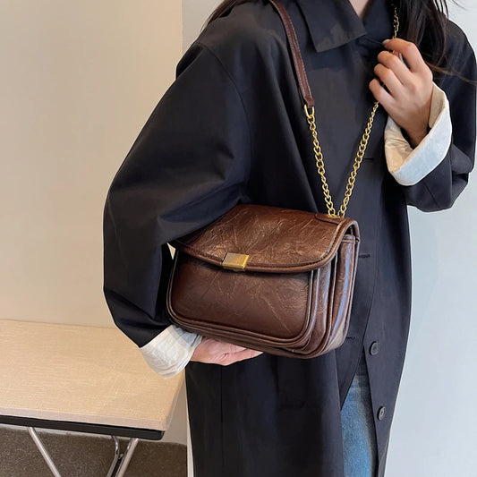 Éveloire Chain Flap Bag