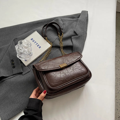 Éveloire Chain Flap Bag